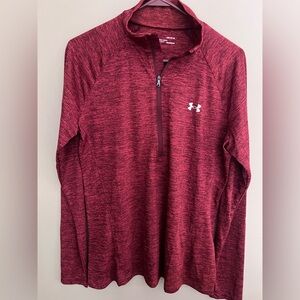 Under Armour Women's Tech 1/2 Zip Twist pullover in a red/maroon color